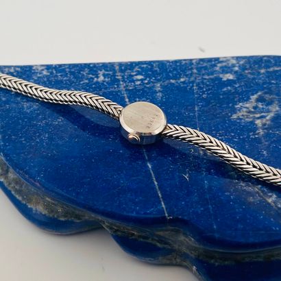 FLAMOR
Montre bracelet de dame en or gris...