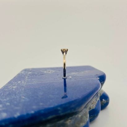 Solitaire en or gris 18K (750) serti d'un...