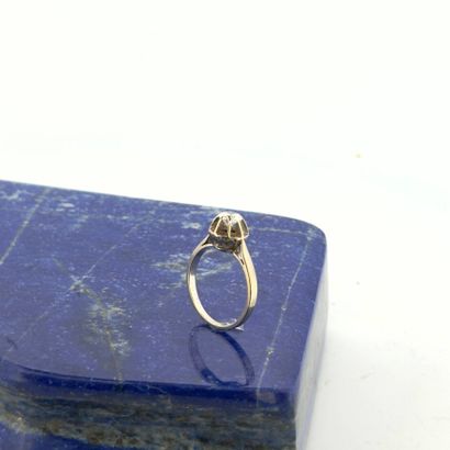 Solitaire en or gris 18K (750) sertie d'un...