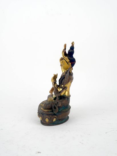 CHINE XXe
Bouddha en bronze à patine dorée...