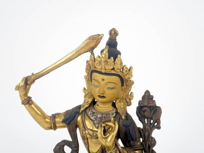 CHINE XXe
Bouddha en bronze à patine dorée...