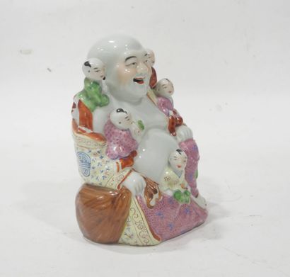 CHINE, XXe
Statuette de Buddha rieur en porcelaine...