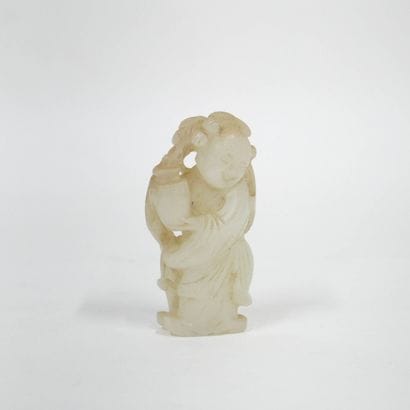 CHINE - Vers 1900
Petite statuette de garçon...