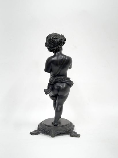 Putti marchant
Bronze à patine noire sur...