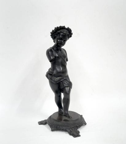 Putti marchant
Bronze à patine noire sur...