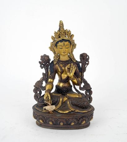 CHINE, XXe siècle
Bouddha en bronze à patine...