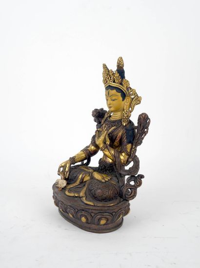 CHINE, XXe siècle
Bouddha en bronze à patine...