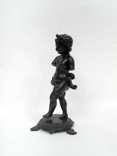 Putti marchant
Bronze à patine noire sur...