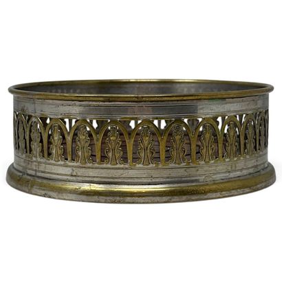 Silver plated metal bottle coaster with an...