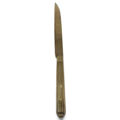 Vermeil (950) knife with molded decoration...