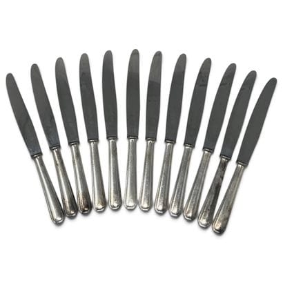 Christofle
Twelve Art Deco-style knives with...