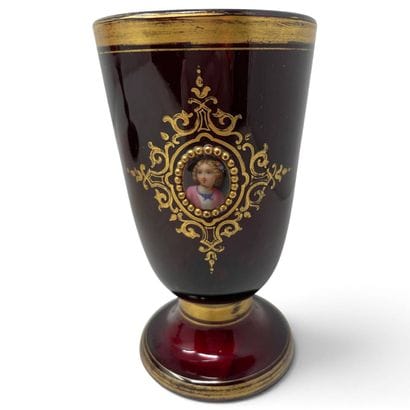Glass on a red-tinted glass pedestal, decorated...