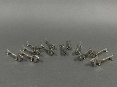 Set of 12 silver plated metal knife holders...
