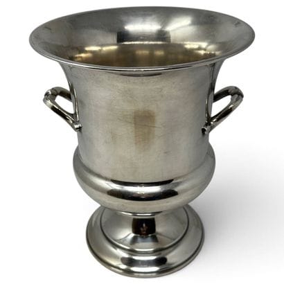 A silver plated champagne bucket in the Medici...