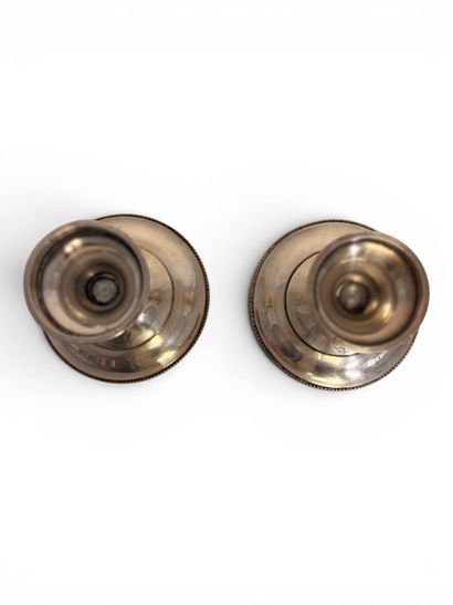 A. COLLIN
Two circular silver-plated candleholder...