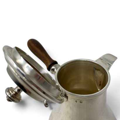 Silver coffee pot with a wooden side handle...