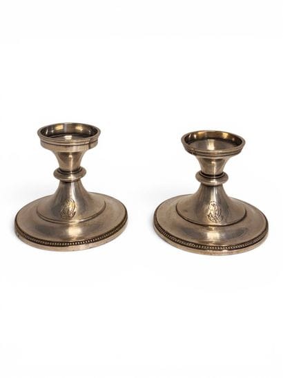 A. COLLIN
Two circular silver-plated candleholder...
