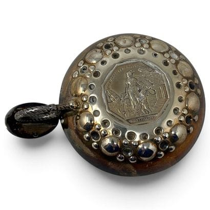 Silver wine decanter decorated with a hexagonal...