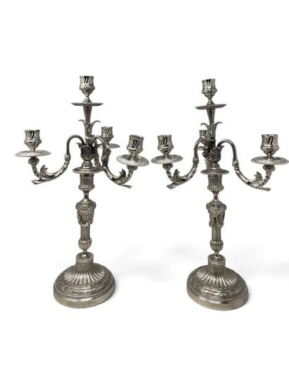 Pair of three-armed silver plated candelabra...