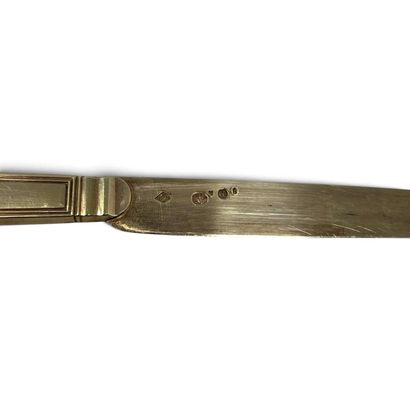 Vermeil (950) knife with molded decoration...