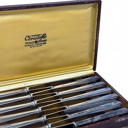 Christofle
Twelve Art Deco-style knives with...