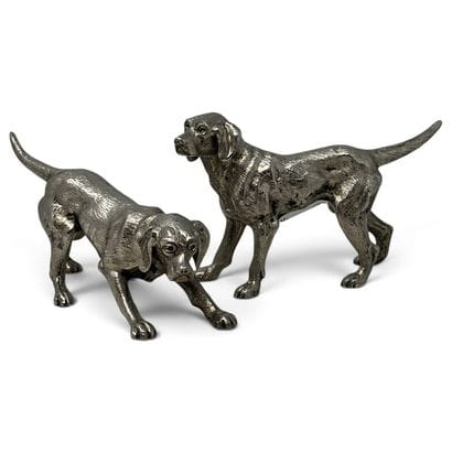 Two silver plated hunting dogs. Slight w...