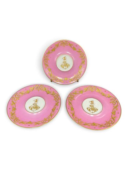 A set of three porcelain cups and saucers...