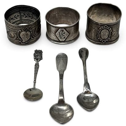 Silverware set: three monogrammed napkin...