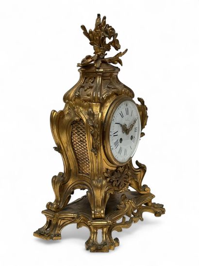 OUDIN et MARTI 
Pendule de style Louis XV...