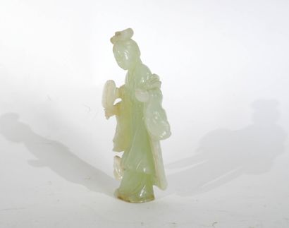 CHINE, XXe siècle 
Personnage au miroir
Statuette...