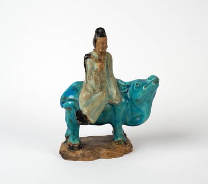 CHINE, XXe siècle
Groupe en grès émaillé...