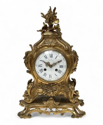 OUDIN et MARTI 
Pendule de style Louis XV...