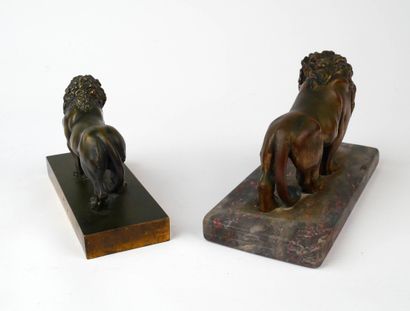 Lot de deux lions en bronze à patine brune...
