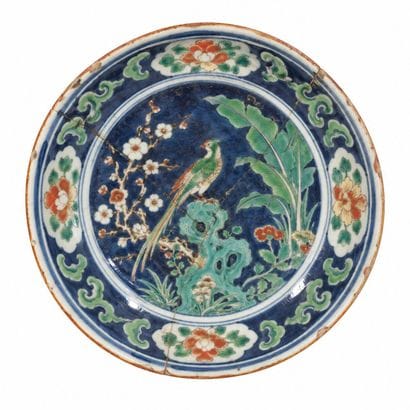 Plat en porcelaine à décor d'un faisan sur...