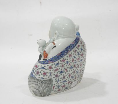 CHINE, XXe
Statuette de Buddha rieur en porcelaine...
