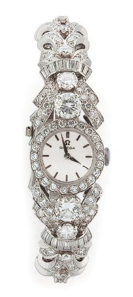 OMEGA.
Montre bracelet de dame en or gris...