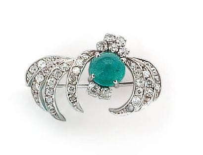 Broche en or gris sertie de diamants taillés...