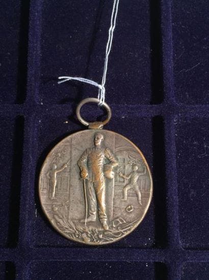[Escrime] 



Médaille en bronze argenté....
