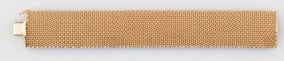 Bracelet souple en or jaune 18K (poinçonné)....