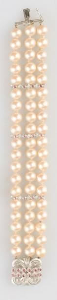 Bracelet trois rangs de 19 imitations de...
