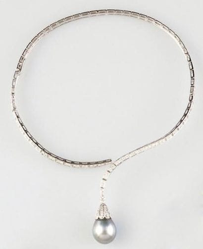 Collier en or 18K orné d'une perle des mers...