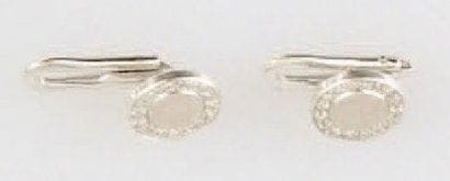 Paire de boutons de manchette en or 18K (testé),...