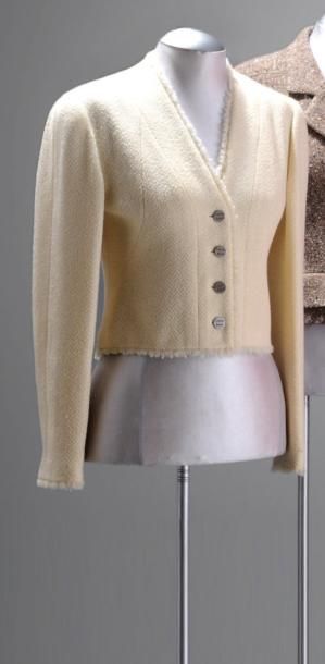 CHANEL
Veste en lainage coquille d'oeuf à...