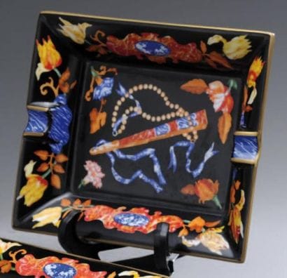 HERMES
Cendrier en porcelaine de Limoges,...