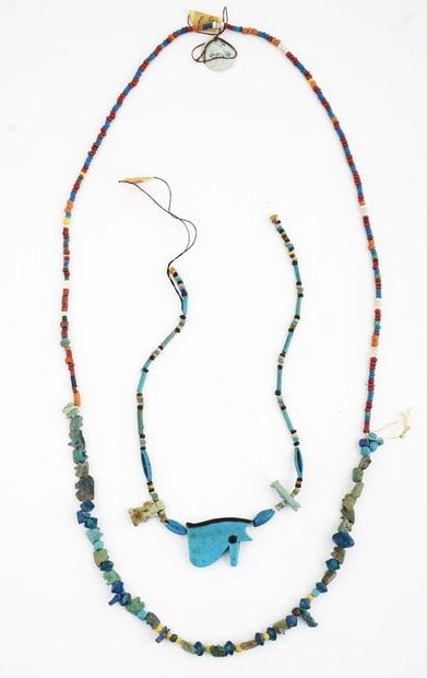 Two Egyptian faience necklaces, one of which...