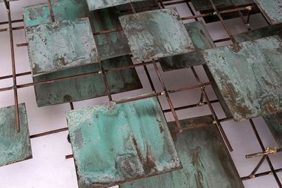 Brass and bronze with grey-green patina wall...