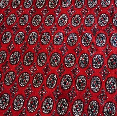 Tapis Boukara aux motifs circulaires sur...