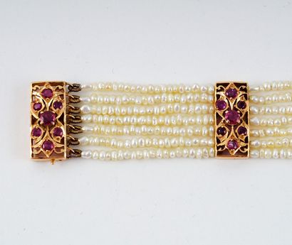 14K GOLD, RUBIES PEARLS

Bracelet with 7...