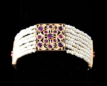 14K GOLD, RUBIES PEARLS

Bracelet with 7...