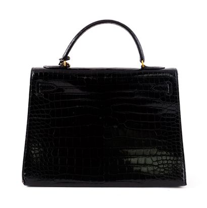 HERMES - KELLY CROCODILE

Hermès bag - Kelly...